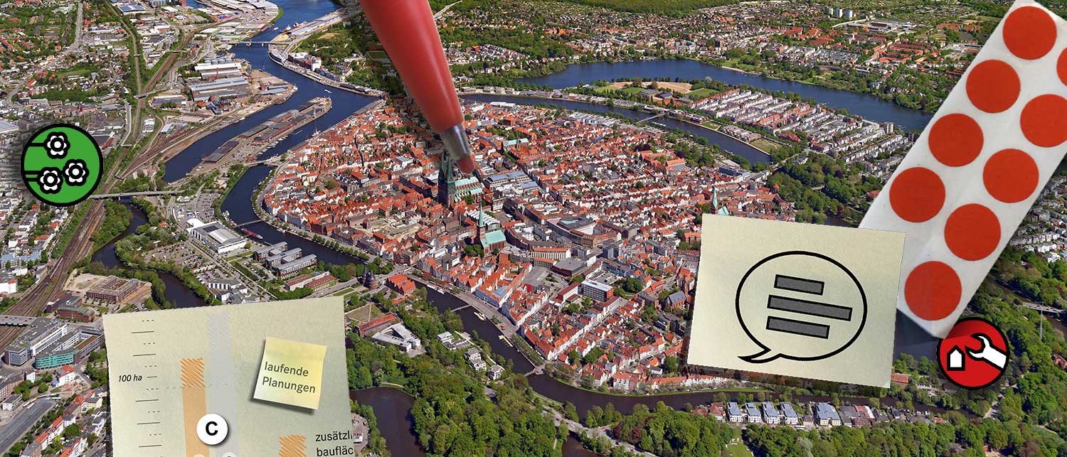Fotomontage: Lübecker Altstadt von oben, mit Aufkleber, Stift und Postit